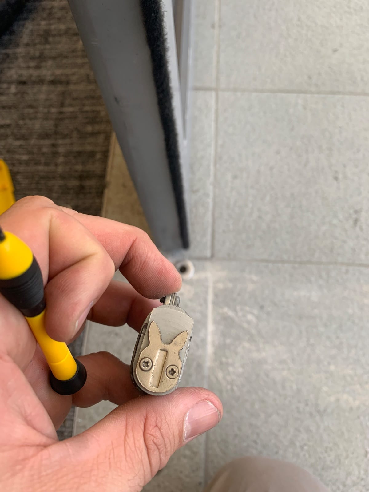 Lock and door repairs to security doors at a Lindfield polling station