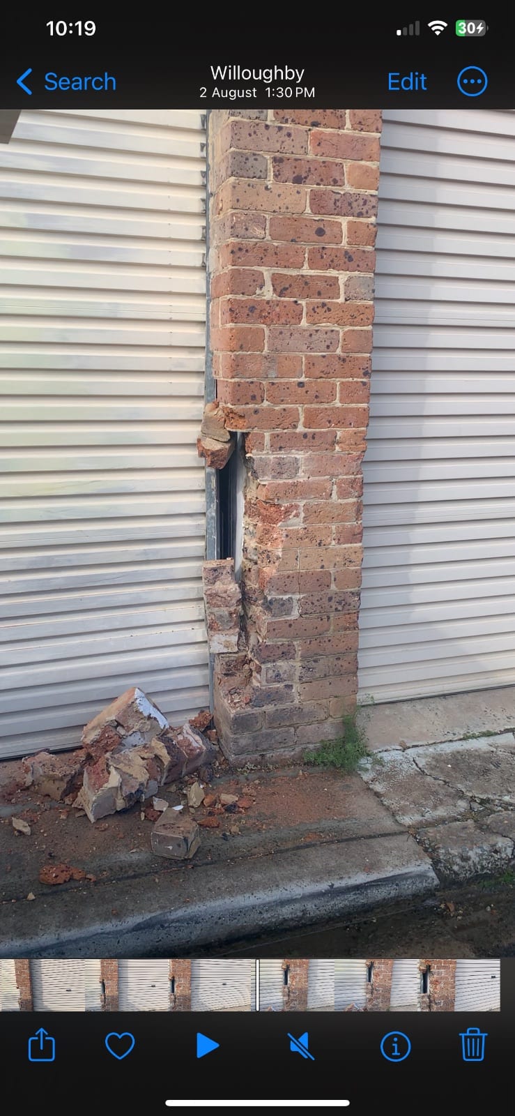 Brick column at a Willoughby strata block after being hit by a garbage truck