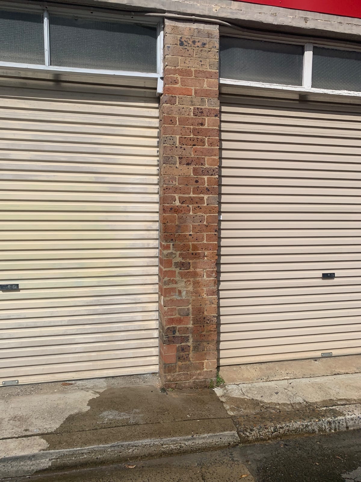 Finished brick column repair at a Willoughby strata block