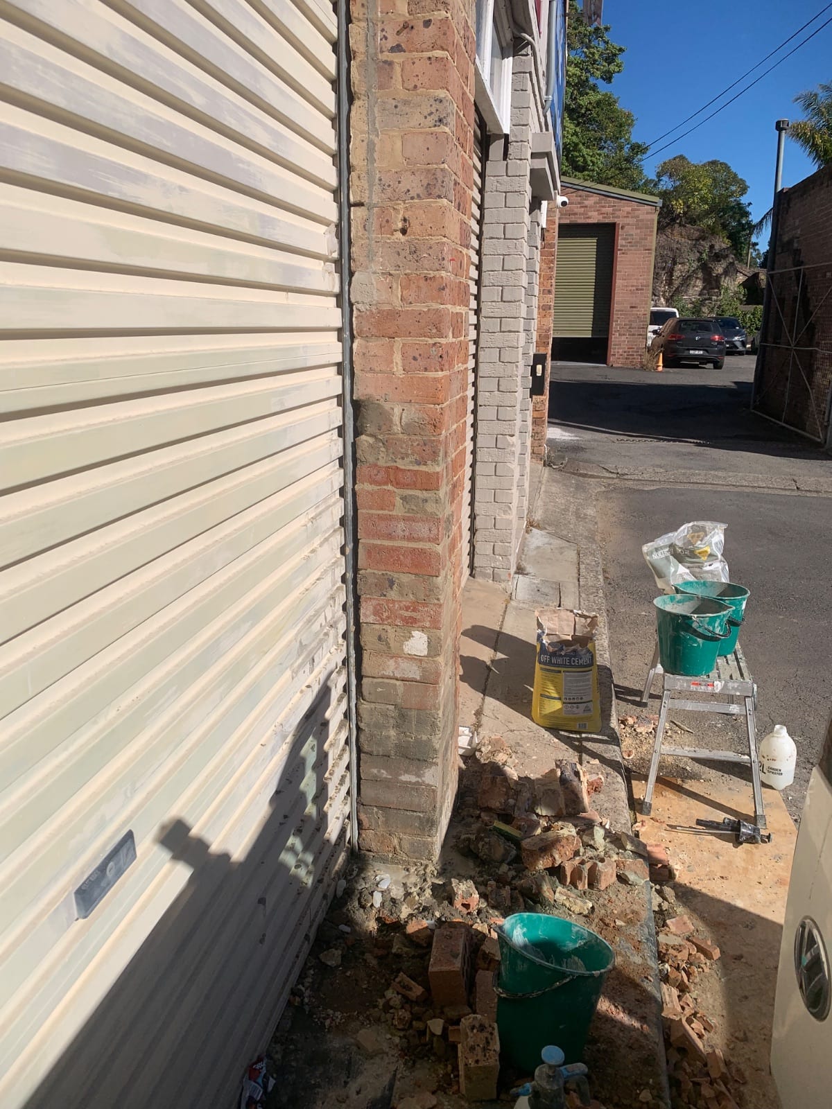 Brick column reinstatement in progress at a Willoughby strata block
