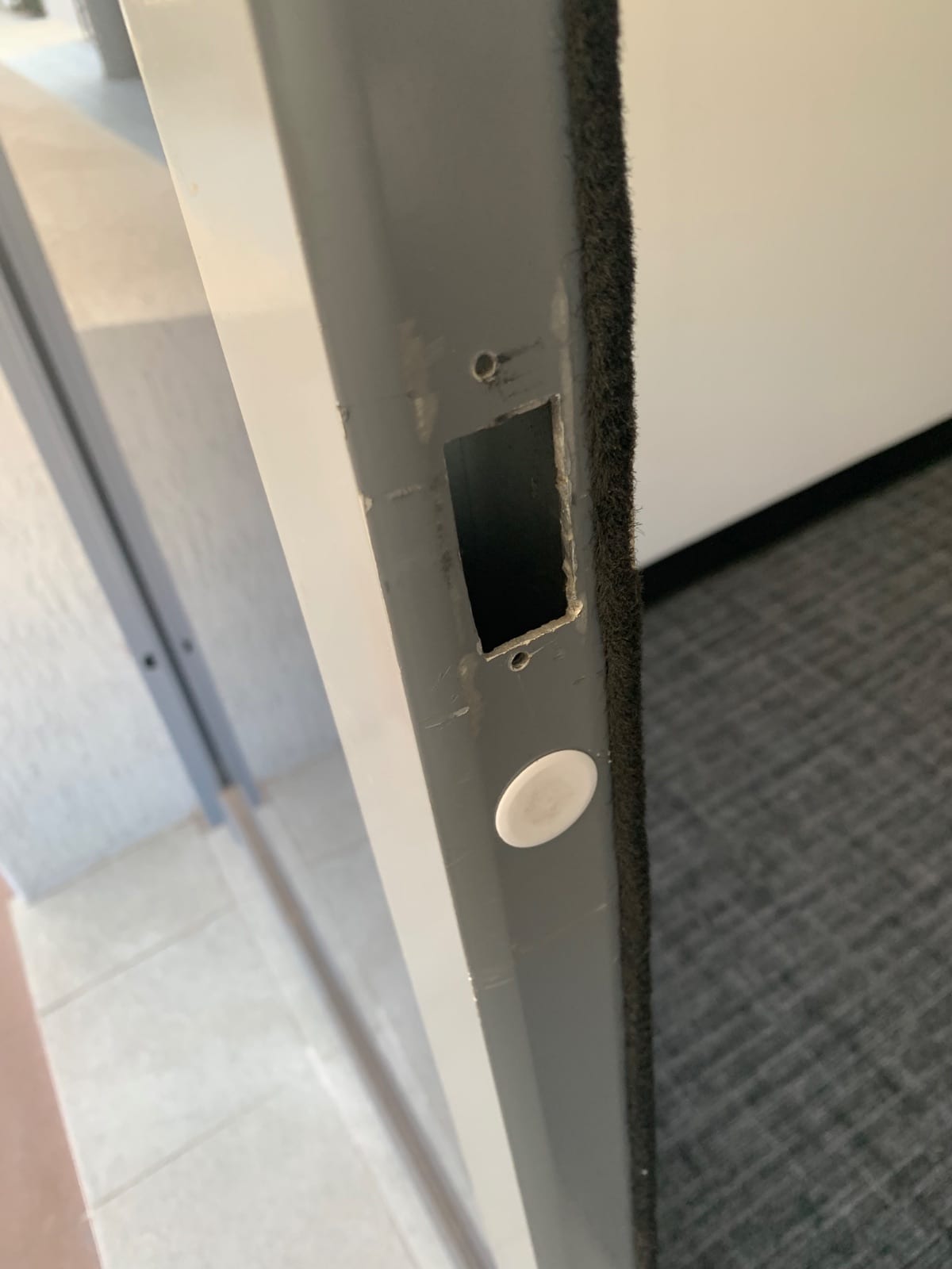 Lock and door repairs to security doors at a Lindfield polling station