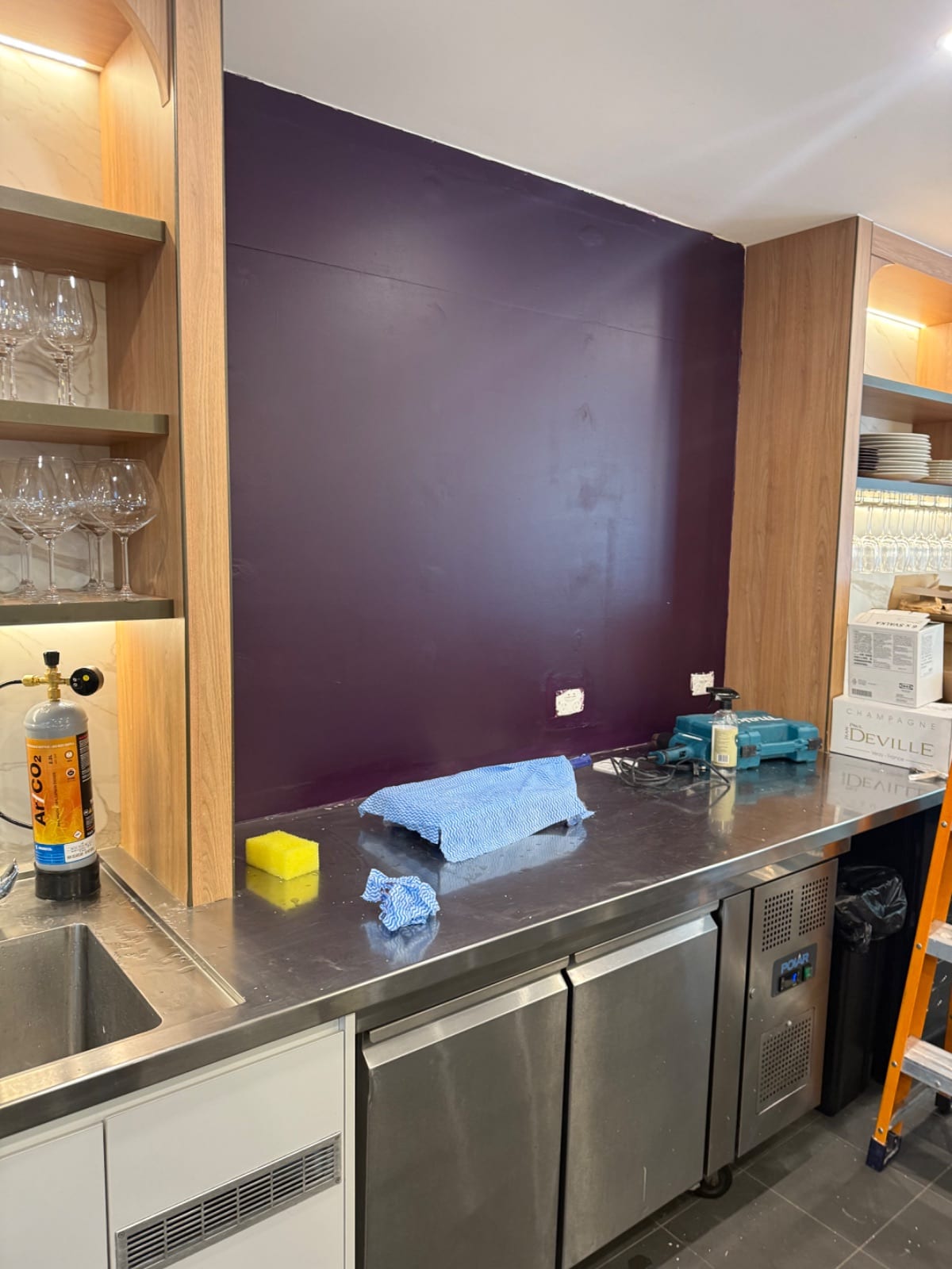 Purple feature wall painted at a St Leonards restaurant