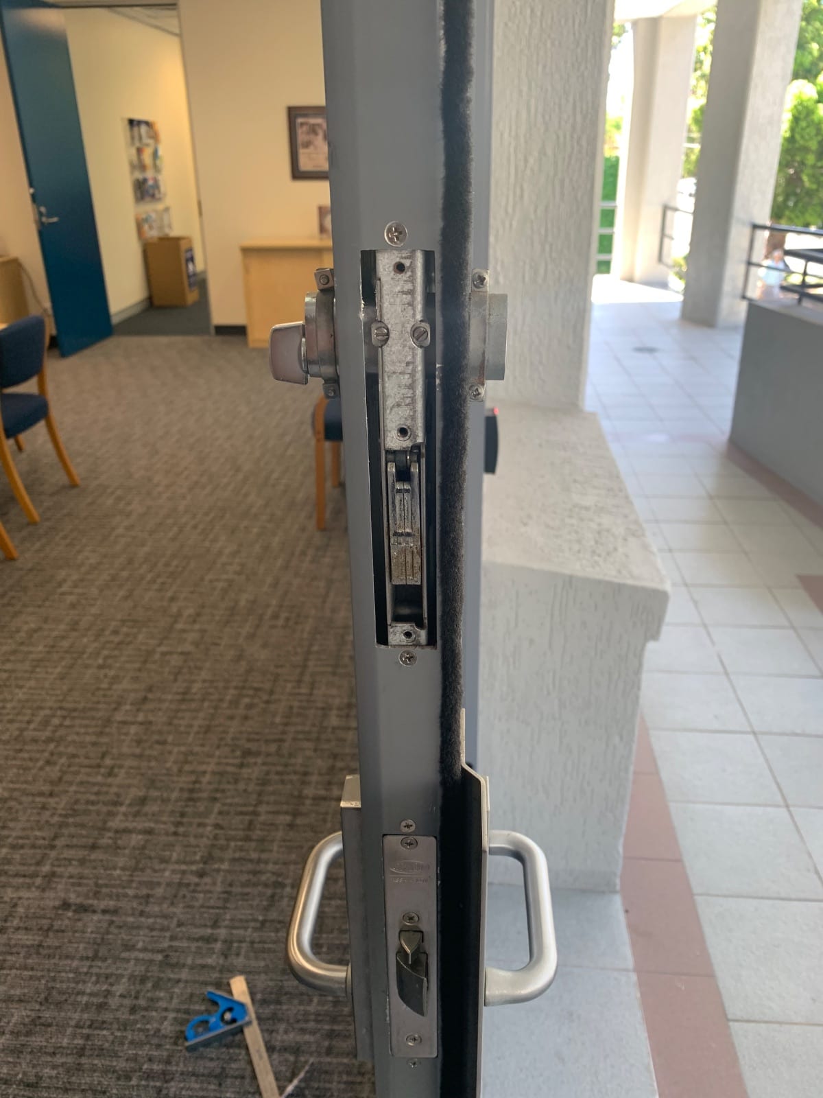Lock and door repairs to security doors at a Lindfield polling station