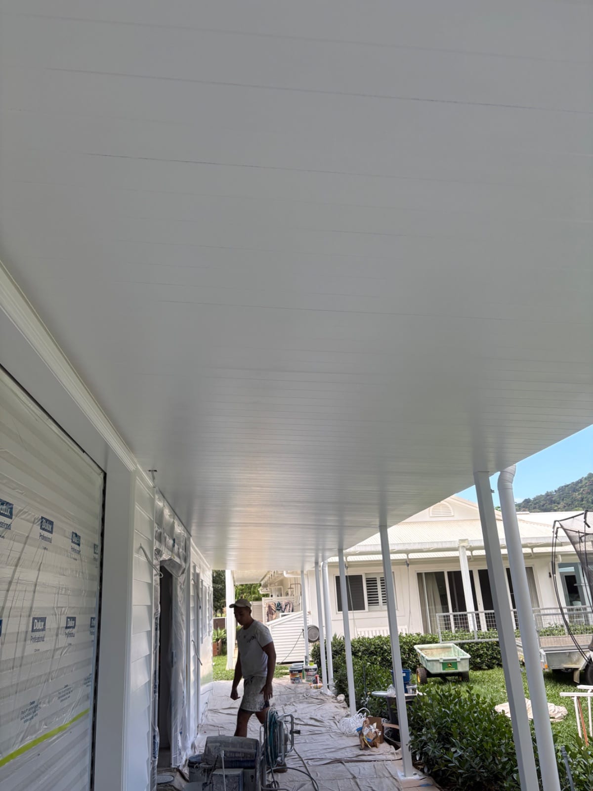 Interior and exterior spray repaint of a low-set weatherboard home in Redlynch Valley