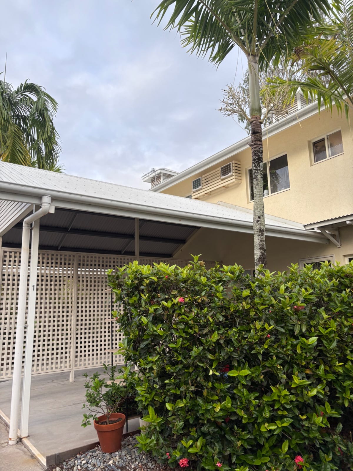 Before shot of a strata townhouse complex in Palm Cove ahead of the external wash down and repaint