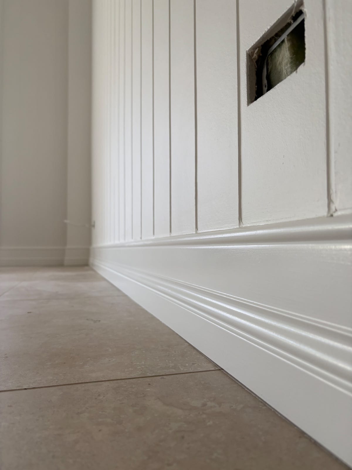 Interior and exterior spray repaint of a low-set weatherboard home in Redlynch Valley